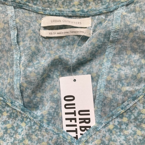 Urban Outfitters mesh top with ruffled sleeves.XS - Picture 3 of 3